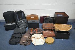 A SELECTION OF LUGGAGE, to include two large suitcases, various briefcases, carrying bags, etc,