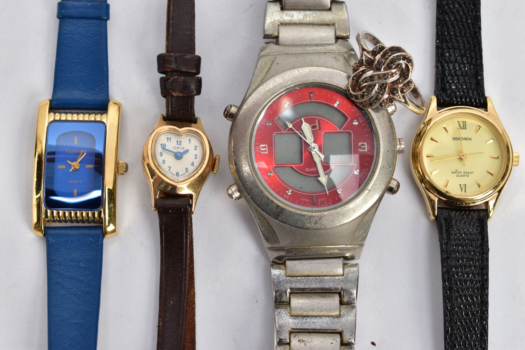 FOUR FASHION WRISTWATCHES AND A RING, to include a gentlemens quartz wristwatch, a ladies ' - Image 2 of 3