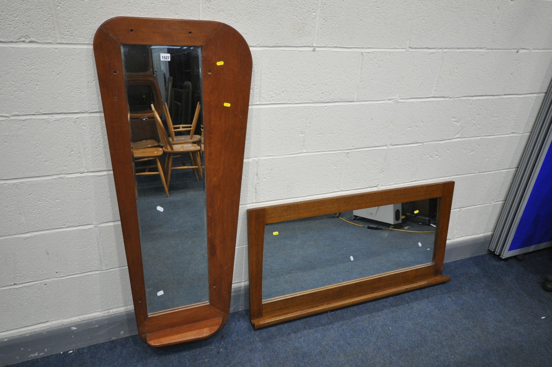 AN OAK WALL MIRROR with a lipped shelf, 120cm x 61cm, and a shaped teak wall mirror (2)