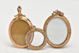 THREE 9CT GOLD PHOTOGRAPH PENDANTS, to include a circular hinged pendant with floral detailing,