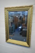 A GILTWOOD FRAMED BEVELLED EDGE WALL MIRROR, 113cm x 83cm