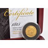 A GOLD 1815 KING LOUIS XVIII 20 FRANC COIN, struck by the royal mint London in its own box with