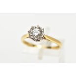 AN 18CT GOLD SINGLE STONE DIAMOND RING, designed with an illusion set round brilliant cut diamond,