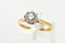 AN 18CT GOLD SINGLE STONE DIAMOND RING, designed with an illusion set round brilliant cut diamond,