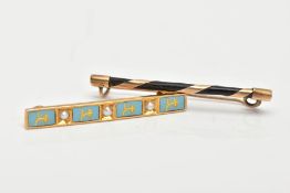 TWO EARLY 20TH CENTURY GOLD BAR BROOCHES, a jet bar wrapped in a gold band, approximate length 32mm,
