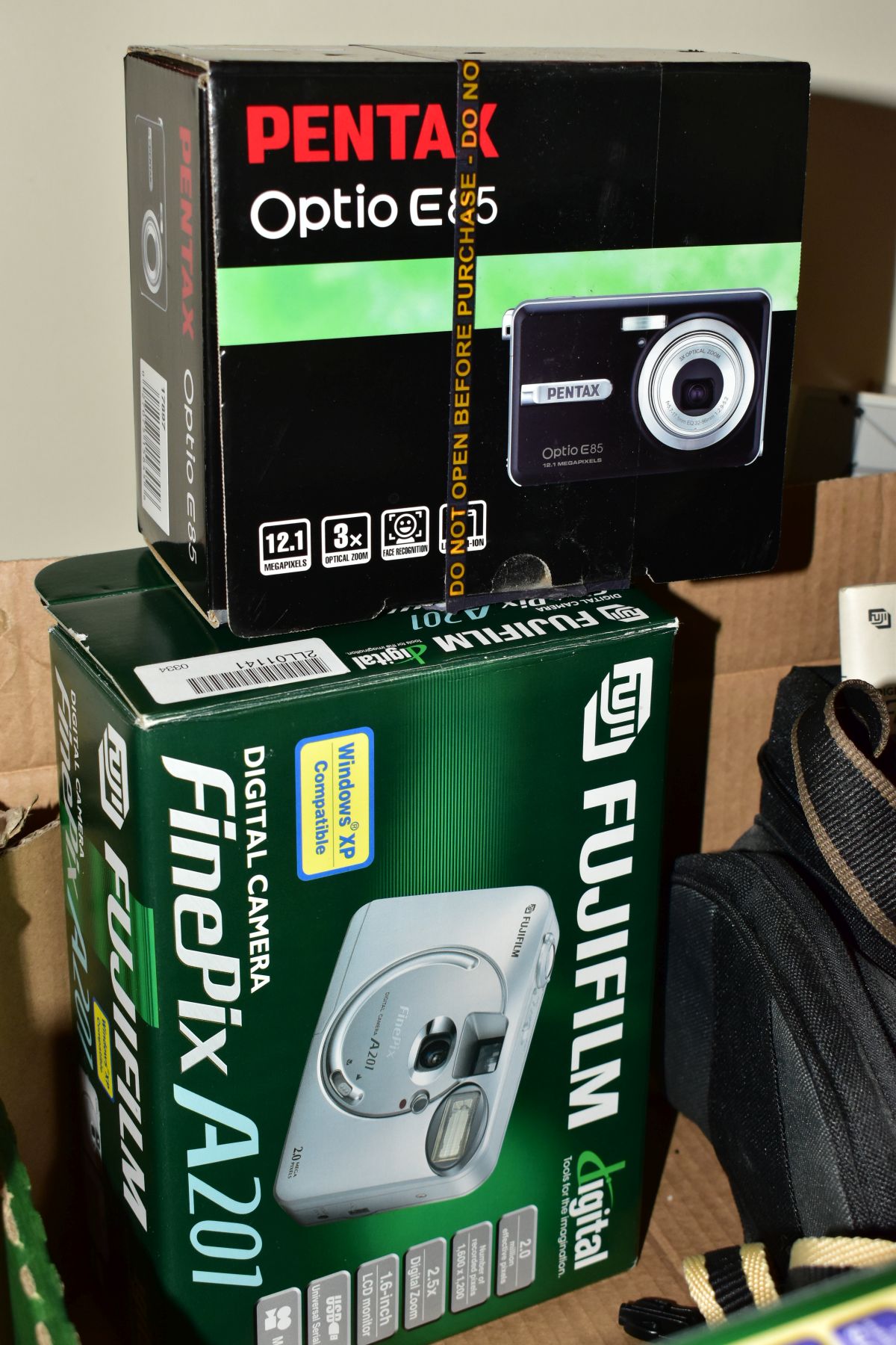 THREE BOXES OF CAMERAS, BINOCULARS, DVDS, CDS, ETC, including a boxed Fujifilm S7000 Finepix digital - Image 9 of 9
