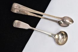 A PAIR OF SILVER SUGAR TONGS AND A SAUCE SPOON, bright cut sugar tongs with a vacant cartouche,