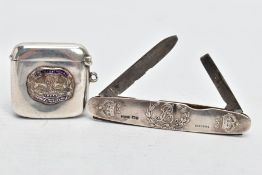 A SILVER VESTA CASE AND FRUIT KNIFE, the vesta of a rounded square form, fitted with an enamelled '