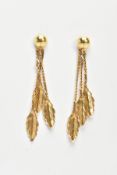 A PAIR OF YELLOW METAL DROP EARRINGS, each stud earring fitted with three chains suspending