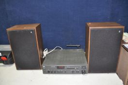 A NAD 7130 STEREO RECEIVER AMPLIFIER with manual (PAT pass and working) and a pair of Acoustic