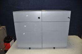 A PAIR OF MODERN METAL OFFICE FILING DRAWERS with three graduated drawers and one key to each