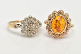 AN AMBER DRESS RING AND A DIAMOND CLUSTER RING, an oval amber cabochon collet set within an outer