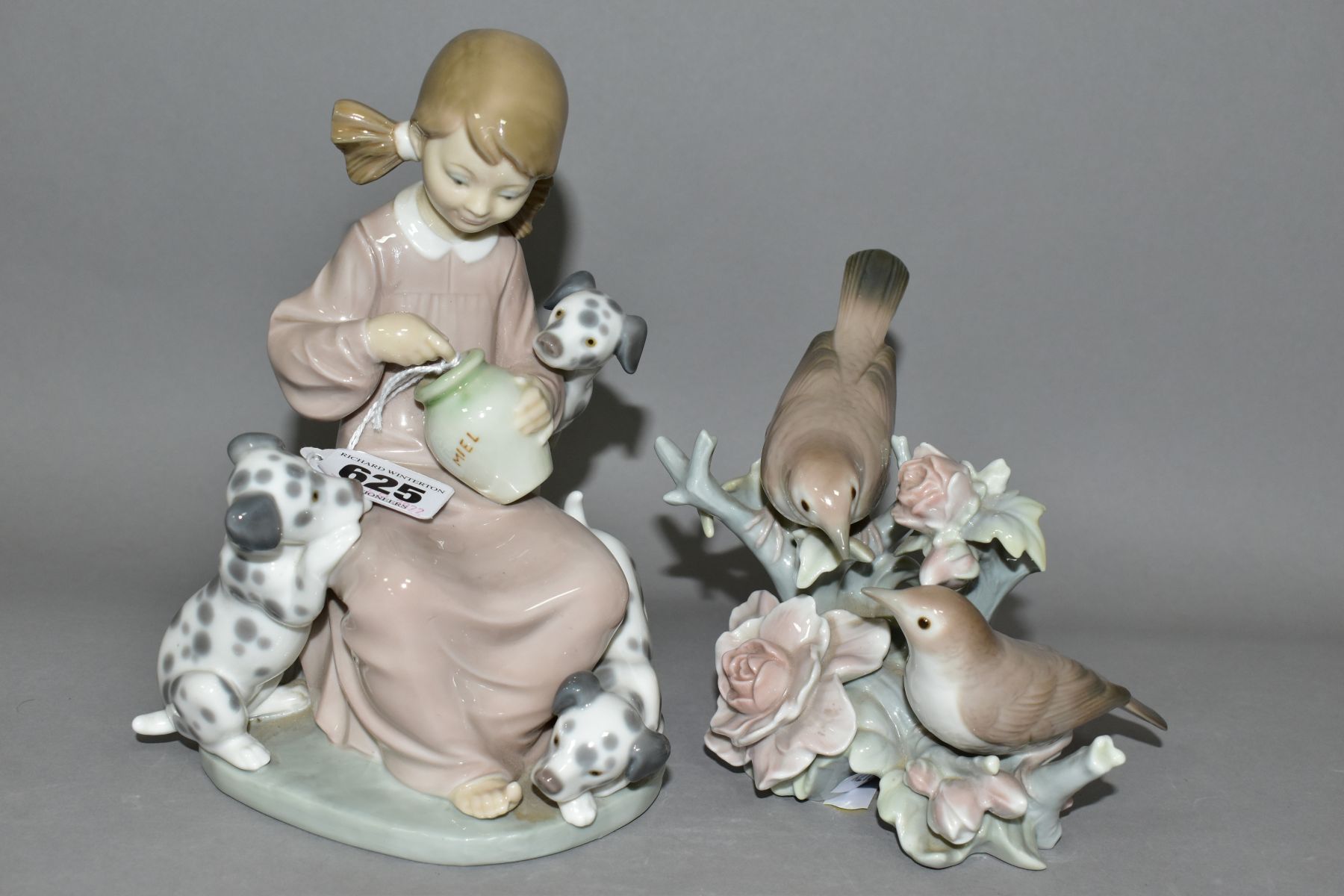 A LLADRO SCULPTURE 'THE SWEET MOUTHED' No 1248, designed by Juan Heurta in 1974, retired 1990,