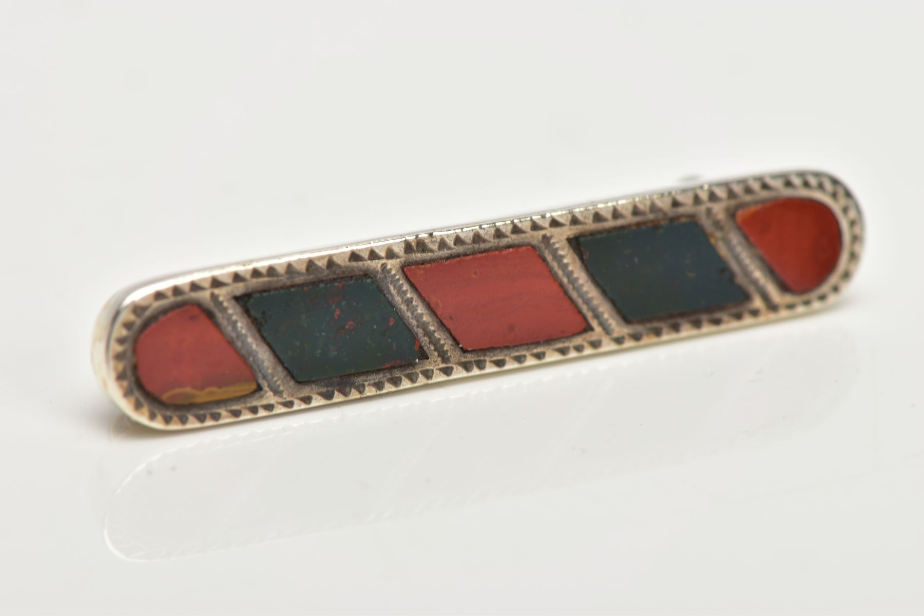 A LATE VICTORIAN SILVER HARDSTONE BROOCH, of an elongated outline inlaid with bloodstone and jasper, - Image 3 of 3