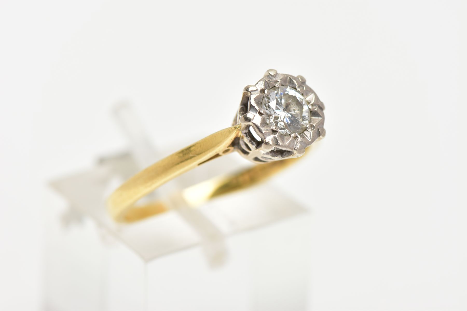 AN 18CT GOLD SINGLE STONE DIAMOND RING, designed with an illusion set round brilliant cut diamond, - Image 4 of 4