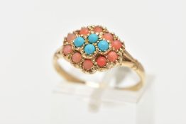 A 9CT GOLD CORAL AND TURQUOISE RING, designed as a cluster of four turquoise and twelve coral stones