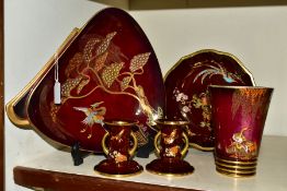 FIVE PIECES OF CARLTON WARE ROUGE ROYALE, comprising a triangular dish in the Heron and Magical Tree