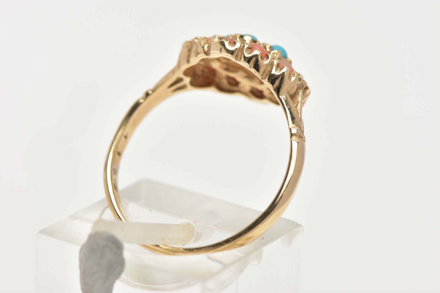 A 9CT GOLD CORAL AND TURQUOISE RING, designed as a cluster of four turquoise and twelve coral stones - Image 3 of 4