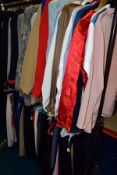 A QUANTITY OF LADIES' CLOTHING, approximately one hundred and twenty modern and vintage items to