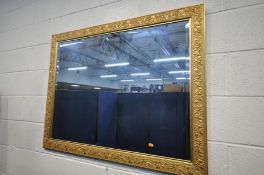 A SELECTION OF MIRRORS, to include a set of three gilt framed bevelled edge mirrors, four other gilt