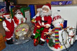 A GROUP OF CHRISTMAS DECORATIONS, mainly boxed and battery/mains operated (untested), to include a