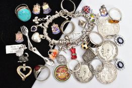 A BAG OF ASSORTED JEWELLERY AND COINS, to include a silver charm bracelet fitted with twelve