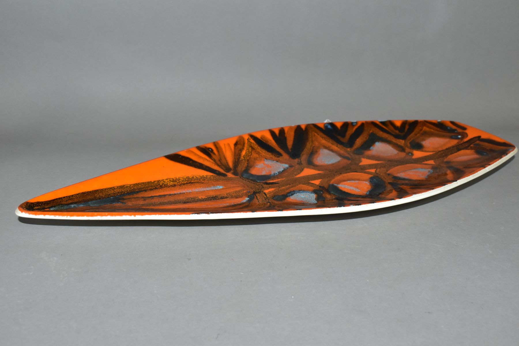 A POOLE POTTERY ORANGE DELPHIS PATTERN SPEAR SHAPED TRAY, printed back stamp, approximate length - Image 4 of 8