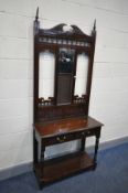 AN EDWARDIAN MAHOGANY HALL STAND, with a mirror back and two drawers, width 89cm x depth 39cm x