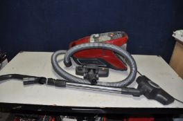 A MIELE BLIZZARD CX1 CAT AND DOG VACUUM CLEANER with two heads (PAT pass and working but needs