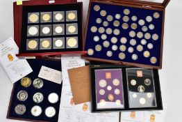 A CARBOARD TRAY CONTAINING COINS AND COMMEMORATIVES, to include a set the last four decades of three