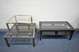 A LATE 20TH CENTURY FRENCH EBONISED COFFEE TABLE, with two opening doors, 110cm x depth 60cm x