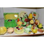 A COLLECTION OF NOVELTY FRUIT AND VEGETABLE SHAPED CARLTON WARE POTTERY AND OTHER CARLTON WARE