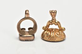 TWO CARVED FOB SEALS, the first a 9ct gold fob seal with oval onyx panel carved to depict a