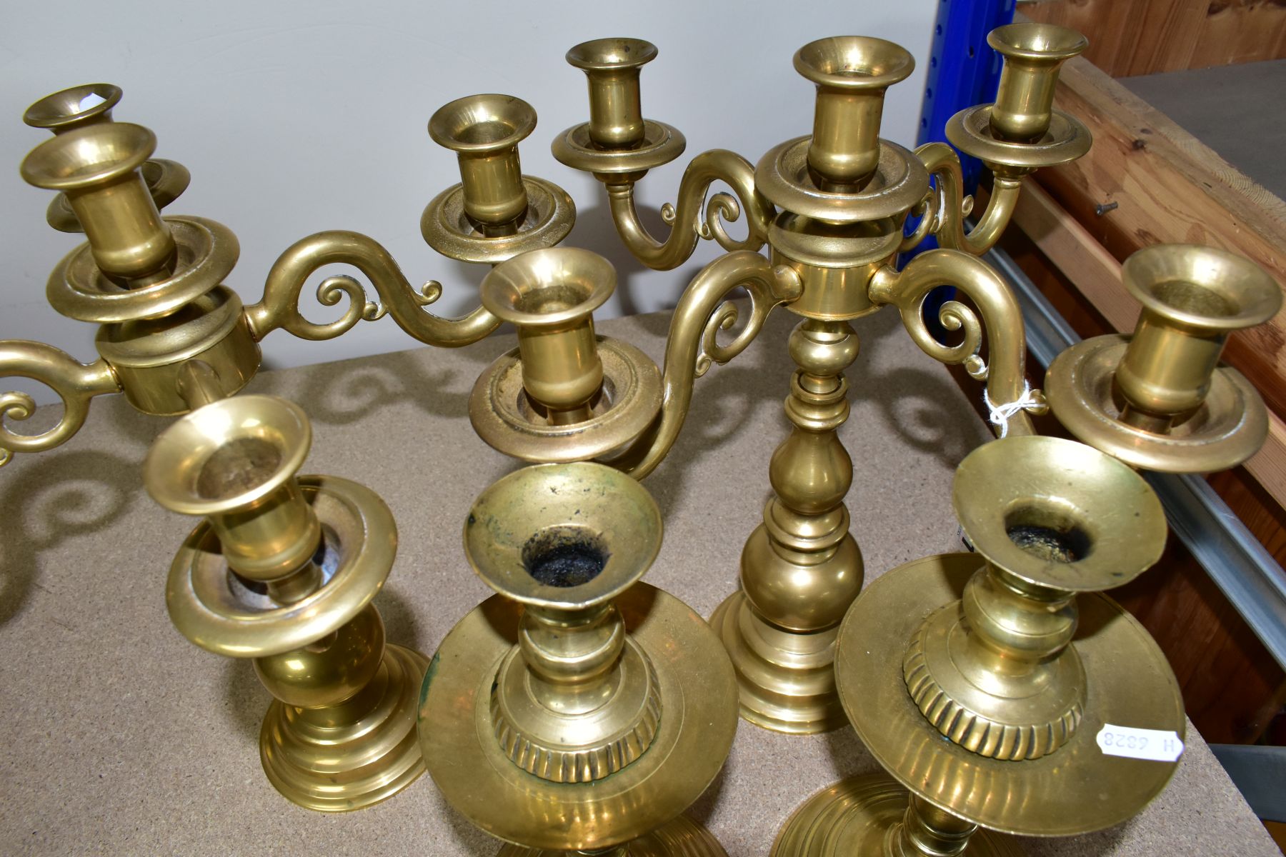 A PAIR OF MODERN BRASS FIVE BRANCH CANDELABRA AND A MATCHED PAIR OF BRASS CANDLESTICKS, the - Image 4 of 6