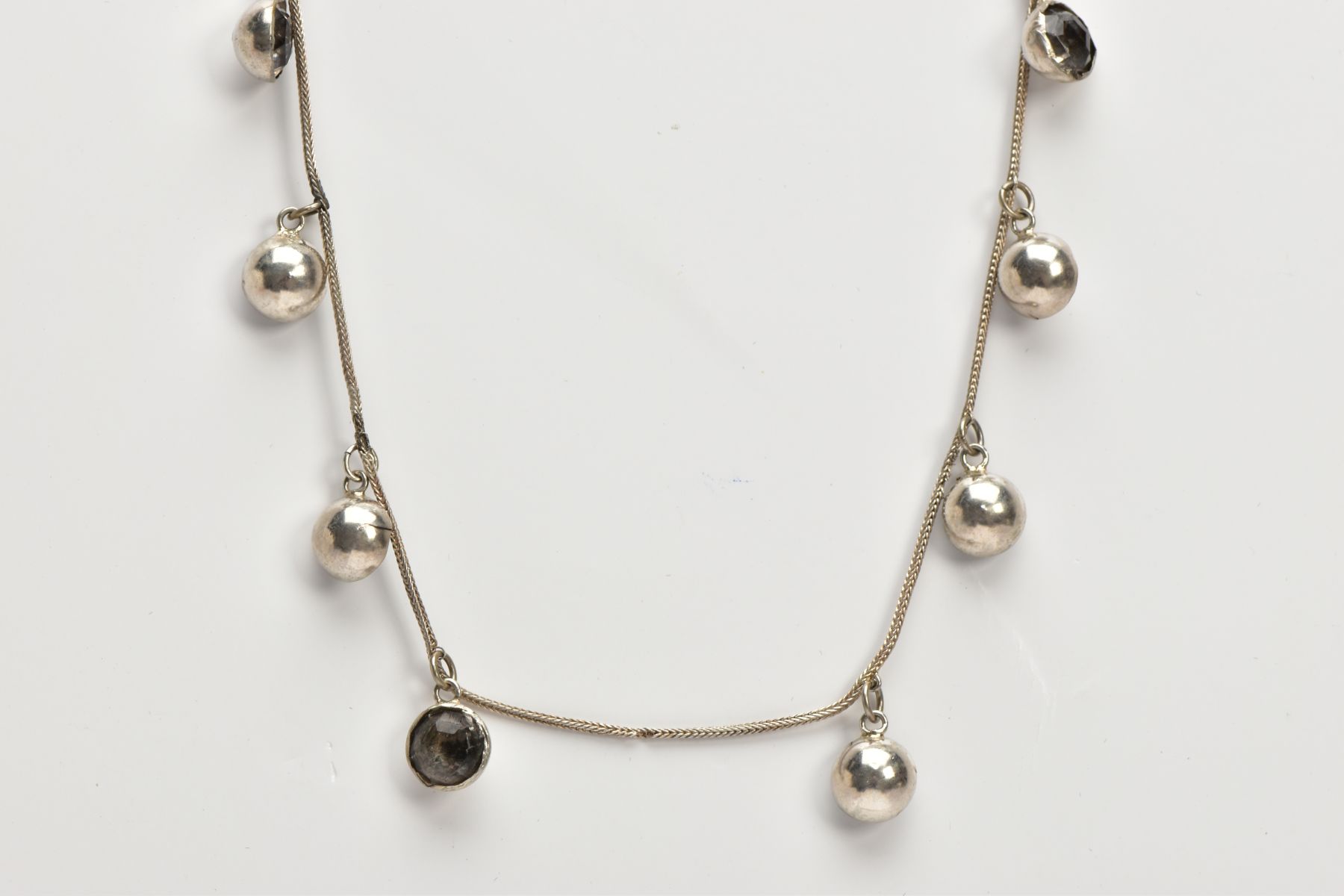 A WHITE METAL AND PASTE NECKLACE, designed as ten old cut paste stones each in a bezel domed back - Image 7 of 7