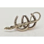 A WHITE METAL BROOCH, designed as two horse shoes, with a crop and hoof, approximate length 54mm,