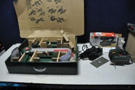 A BOSCH PLS 300 SAW STATION in box, a Bosch PST 54 E Jigsaw and a Black and Decker BD 180E 1/3 sheet