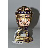 A ROYAL CROWN DERBY TRIPOD BASE POT POURRI VASE WITH COVER, decorated in the Imari pattern,