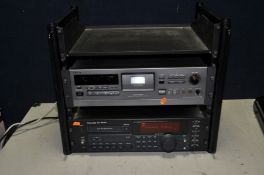 A 12U STUDIO RACK CONTAINING A TASCAM DA-45HR DAT RECORDER, a Sony PCM R300 DAT recorder, four fibre