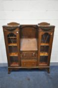 AN EARLY 20TH CENTURY OAK SIDE BY SIDE BUREAU BOOKCASE, width 124cm x depth 38cm x height 146cm (