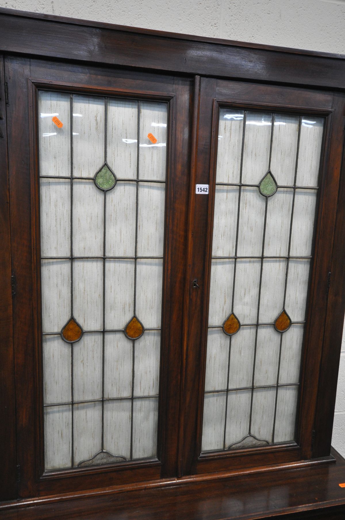 AN EARLY 20TH CENTURY MAHOGANY BOOKCASE, the upper section with double lead glazed/stained glass - Image 2 of 3