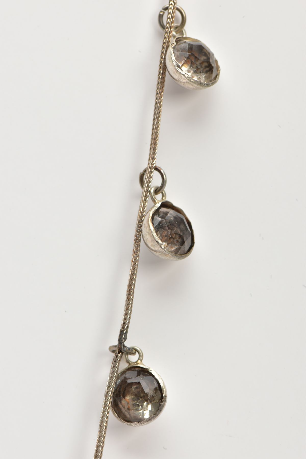 A WHITE METAL AND PASTE NECKLACE, designed as ten old cut paste stones each in a bezel domed back - Image 5 of 7