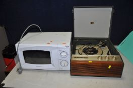 A DAEWOO MICROWAVE (PAT pass and working) and a vintage HMV record player (no plug so untested)