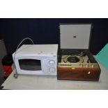 A DAEWOO MICROWAVE (PAT pass and working) and a vintage HMV record player (no plug so untested)