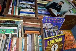 FOUR BOXES OF BOOKS, CDS AND RECORDS, approximately sixty to eighty books in three boxes, titles