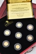 A CASED SET MAGNIFICENT SEVEN GOLD COINS, to include seven gold coins from different countries, a