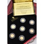 A CASED SET MAGNIFICENT SEVEN GOLD COINS, to include seven gold coins from different countries, a