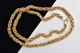 A YELLOW METAL CHAIN, byzantine chain fitted with a lobster claw clasp, stamped '750', length 470mm,