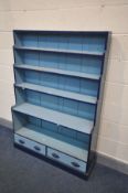 AN EARLY 20TH CENTURY BLUE PAINTED PINE CASCADE OPEN BOOKCASE, with two drawers, width 109cm x depth