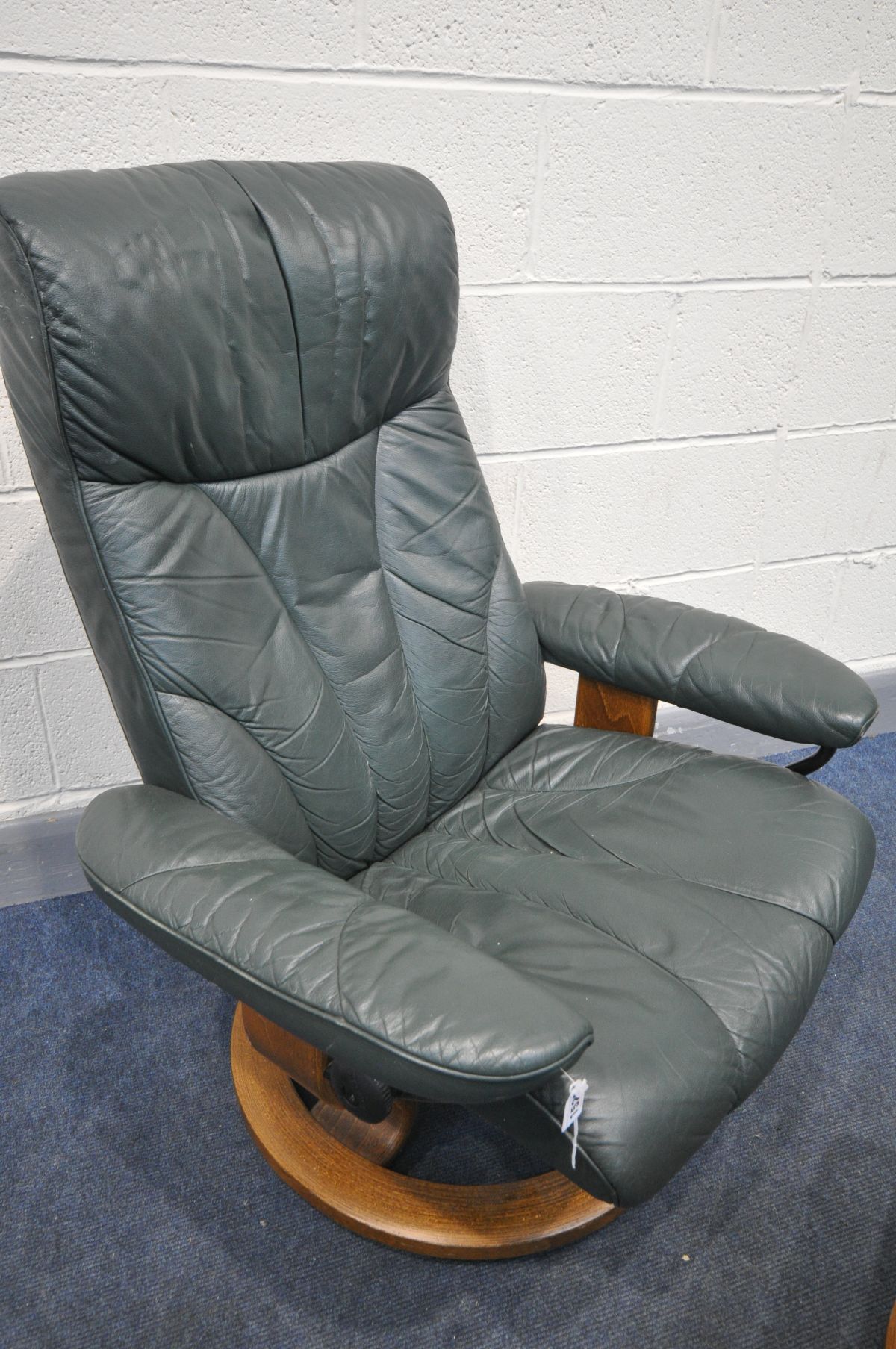 A GREEN LEATHER EKORNES STRESSLESS RECLINING SWIVEL ARMCHAIR, and a matching blue leather stool (2) - Image 2 of 2
